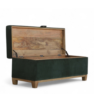 Angled view of Emerald Green Velvet Storage Ottoman Box, showing the upholstered seat, legs and silhouette
