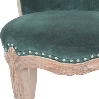 Side view of Emerald Green Velvet Studded Chair, showing the upholstered seat, legs and silhouette