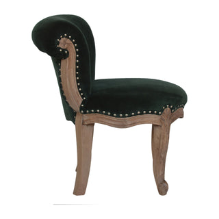 Leg detail view of Emerald Green Velvet Studded Chair, showing the upholstered seat, legs and silhouette