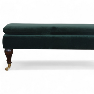 Leg detail view of Emerald Velvet Storage Bench with Castor Legs, showing the upholstered seat, legs and silhouette