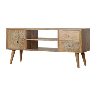 Side angle view of Fern Media Unit Natural Oak Mango Wood Tropical Leaf Resin Embossed Door and Drawer Fronts Nordic Legs