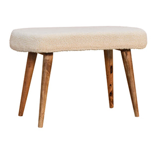 Angled view of Floss Upholstered Bench Cream bouclé Smooth Oval Seat Natural Oak Nordic Splayed Legs