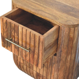 Fluted bedside with drawer open showing solid wood interior
