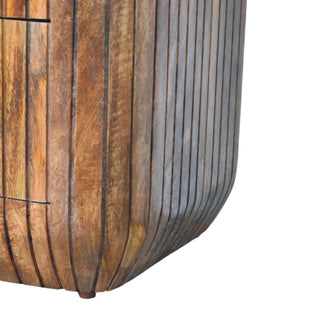 Fluted bedside three-quarter angled view showing fluted drawer fronts