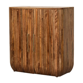 Side angle view of Fluted Curve Cabinet, showing the storage shape and furniture finish