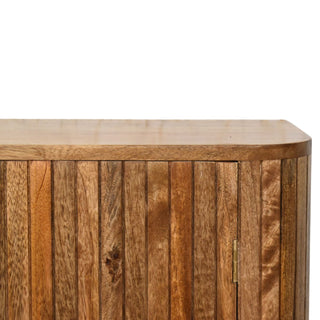 Close-up of fluted finish on Fluted Curve Cabinet, showing the storage shape and furniture finish