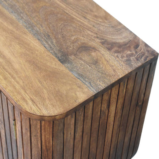 Finish detail view of Fluted Media Console with Shelves, showing the storage shape and furniture finish