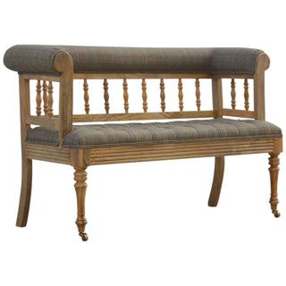 Angled view of Hadley Hallway Bench Multi Tweed Button Tufted Low Spindle Back Brass Castors Antique Studs
