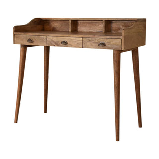 Side angle view of Halston Writing Desk Mango Wood Triple Drawer Gallery Back with Cable Management