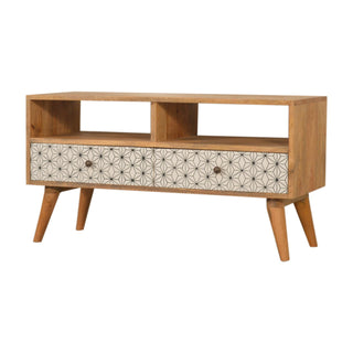 Side angle view of Hana Media Unit Oak Mango Wood Black and White Star-Pattern Screen-Printed Drawers with Nordic Legs