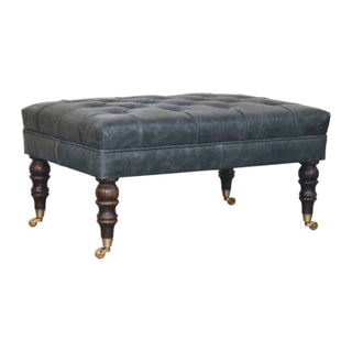 Angled view of Indra Ottoman Bench Teal Buffalo Leather Hand-Tufted Brass Castor Turned Legs