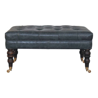 Front view of Indra Ottoman Bench Teal Buffalo Leather Hand-Tufted Brass Castor Turned Legs