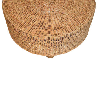 Side angle view of Isla Round Rattan Coffee Table Handwoven Drum Natural Honey Ball Feet