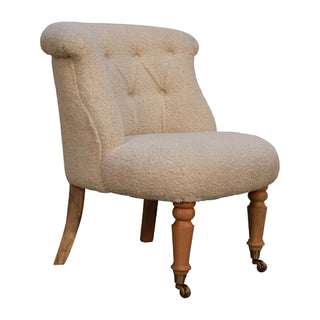 Angled view of Ivory Accent Chair Cream bouclé Buttoned Tub Caster Turned Leg