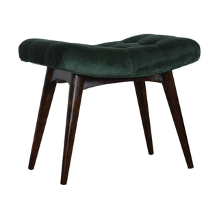 Angled view of Juniper Upholstered Bench Emerald Green Velvet Button Tufted Curved Saddle Compact Nordic Legs