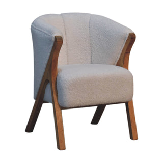 Angled view of Luna Accent Chair White bouclé Minimalist Tub Exposed Wood Frame