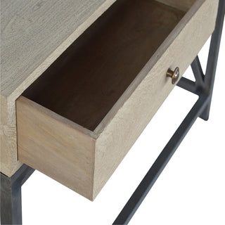 Close-up of finish detail on Mango Wood Metal Base Console Table, showing the tabletop, frame and furniture finish