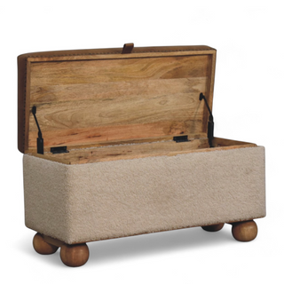 Angled view of Mid Century Modern Bouclé Lid-Up Storage Ottoman, showing the upholstered seat, legs and silhouette