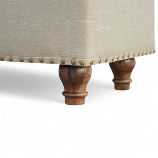 Close-up of finish detail on Mid-Century Modern Linen Storage Bench with Studded Detail
