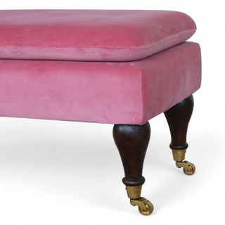 Leg detail view of Mid-Century Modern Pink Velvet Bench with Castor Legs