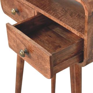 Angled detail view of Mini Curved Honey Caramel Console Table, showing the tabletop, frame and furniture finish