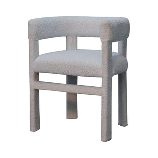 Angled view of Neve Accent Chair Snow White bouclé Slatback Chunky Block Frame