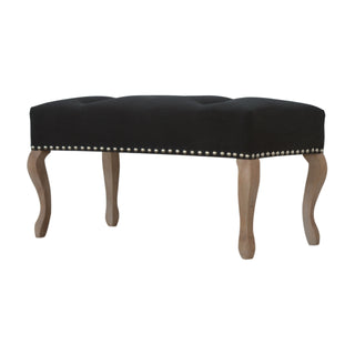 Angled view of Noir Bedroom Bench Black Velvet Button Tufted Antique Brass Studs French Cabriole Legs