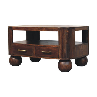 Side angle view of Orb Coffee Table with Drawers Solid Mango Wood Fluted Sides Sphere Feet Walnut