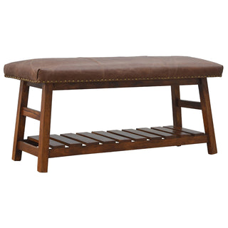Angled view of Ranger Shoe Storage Bench Buffalo Hide Leather Seat Slatted Wood Shelf Brass Studs Light Walnut