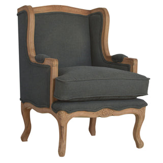 Angled view of Remy Armchair Ink Linen French Carved Wingback Removable Pad
