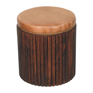 Ribbed leather accent stool side view right showing ribbed leather texture and solid wood legs