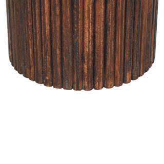 Rear view of ribbed leather accent stool showing solid wood leg construction