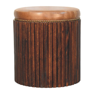 Ribbed leather accent stool front view showing ribbed leather upholstery