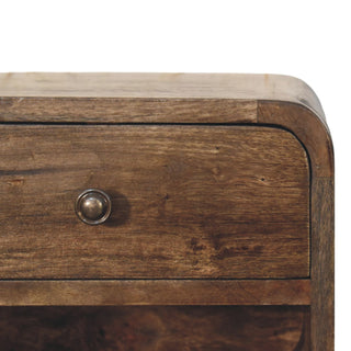 Floating nightstand front close-up showing rounded corners and antique brass knob