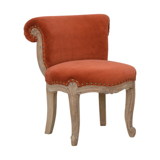 Angled view of Sienna Accent Chair Brick Red Velvet Studded Scroll Back Cabriole