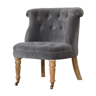 Angled view of Sterling Accent Chair Grey Velvet Buttoned Tub Caster Oak Leg