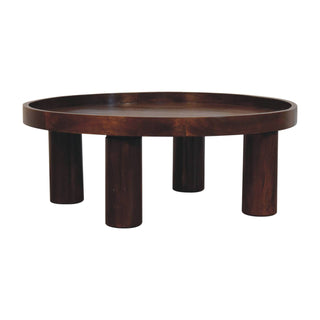 Side angle view of Totem Round Coffee Table Solid Mango Wood Cylinder Legs Tray Top Chestnut