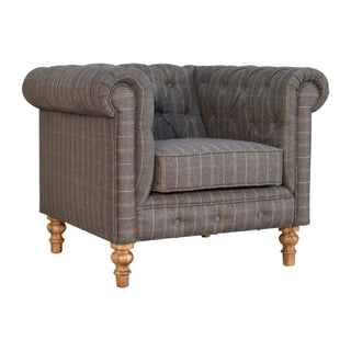 Side angle view of Winston Armchair Pewter Tweed Chesterfield Buttoned Turned Leg