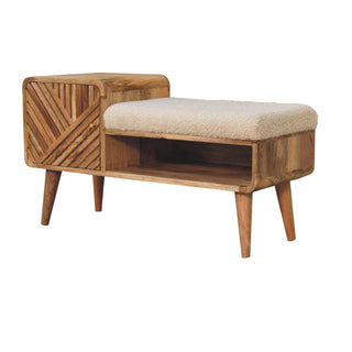 Angled view of Wren Storage Bench Cream bouclé Seat Hand-Carved Diagonal Panel Side Drawer Oak Nordic Legs